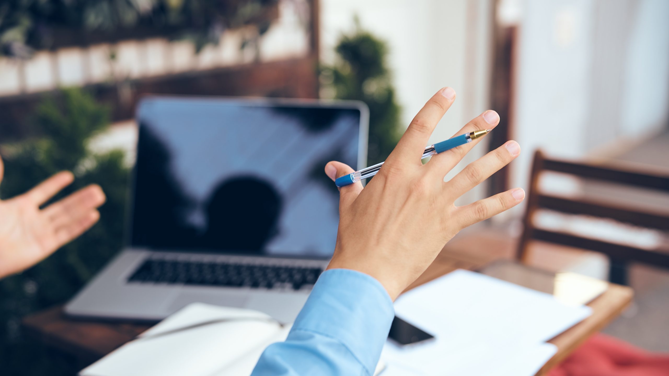 manager working in cafe with laptop outdoors. High quality photo